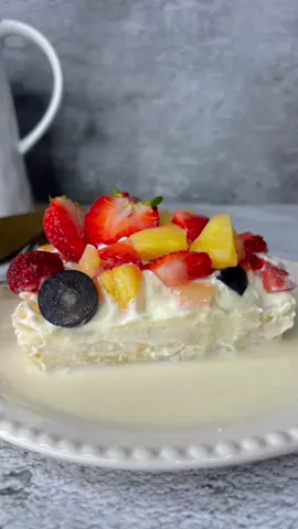 ‏Vanilla cake with cream and fruits ‏3 eggs ‏1 tsp vanilla  ‏1/2 cup  sugar  ‏1/2 cup vegetable oil  ‏1/2 cup milk ‏1 1/2 cup flour  ‏1 tsp baking powder  ‏Pinch of salt  ‏Start by mixing eggs , sugar and vanilla for at least 5 minutes then add oil and milk . Mix then add flour, baking powder and salt . ‏Add the mixture in a rectangle tray brushed with butter. ‏Place in the oven for 1/2 hour at 180 degrees.  ‏Once the cake is out and warm add the 3 milks to it which is : ‏1 cup milk ‏1 cup evaporated milk  ‏1/2 cup condensed milk  ‏For the cream layer ‏600 ml thickened cream  ‏2 tb sugar  ‏1 tsp vanilla  ‏Mix then place on the cake  ‏Finally add fruits you love place in the fridge for an hour  ‏Enjoy  ‏‎كيك مع طبقة كريمة وفواكة  ‏‎مكونات كيكة الفانيلا (الطبقة الاولى)  ‏‎٣ بيض ‏‎نص سكر ‏‎م ص فانيلا ‏‎١/٢ كاسة زيت نباتي ‏‎١/٢ كاسة حليب سائل  ‏‎كاسة ونص طحين ‏‎م ص بيكنغ باودر ‏‎رشة ملح ‏‎الطريقة : بخلط البيض مع السكر والفانيلا بعدها بضيف الحليب الزيت واخر شي الطحين تدرجيا ، بحطهم بصينية مستطيلة الحجم مدهونة بالزيت  وبالفرن على درجة حرارة ١٨٠ لمدة نص ساعة او اقل ‏‎بس يطلع الكيك من الفرن ويصير دافي بشربو ب   ‏‎التسقاية :  ‏‎كاسة حليب سائل  ‏‎كاسة حليب مبخر (اذا مو متوفر يستبدل بالحليب السائل) ‏‎نص حليب مكثف محلى  ‏‎الطبقة الثالثة :  ‏‎٦٠٠ مل كريمة خفق او حلويات ‏‎٢ م ك سكر ‏‎١ م ص فانيلا  ‏‎الطريقة نخلطهم منيح لحد ما يتماسك الخليط   ‏‎اخر شي بضيف الفواكة برجع الحلو عالثلاجة ساعة  ‏‎وصحتين وهنا  ‏#recipes #recipeoftheday #cakesofinstagram #cakesicles #virul #virulreels #reelsvideo #reelsviral #حلى_سهل #حلى_قهوه #حلى_بارد #حلى_منزلي #حلى_بارد_سهل #حلى_سهل_وسريع #اطيب_وصفة #اطيب_الحلويات #ترند #ريلز_explor #ريلز_أكسبلور 
