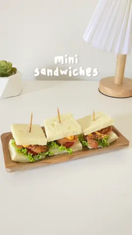 they’re so cutee, aren’t they?🥺 kali ini aku bikin mini sandwiches🥪 lucuk abisss soalnya bite size, jadi bisa sekali hap makannya😂 dibawa piknik juga okeee bgt ini😚🧺  🥪 mini sandwiches 🥪 *roti *selada *tomat ceri *chicken crispy  *spicy mayo step by step di video🌈 selamat mencobaa!😚 #EasyRecipe #homecooking #tiktokfood #resepmasakan #idebekal #videomasak #doyanmasak #aesthetic #reelsinstagram #reels #resepsimple #reseptiktok #anakkost #ricecooker #cemilansimple #resepcemilan #airfryer #bake