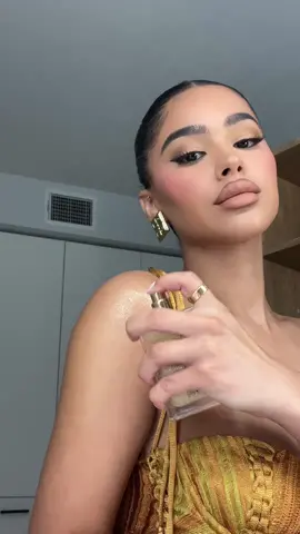 Getting ready to go out using one of my fav body oils 🤍✨ @ABH Cosmetics  #fyp #bodyoil #grwm 