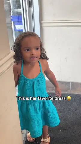 She loves this blue dress 😂😂 