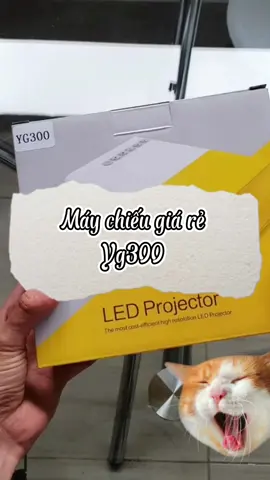 Máy chiếu mini YG-300 Smart LED Projector sử dụng công nghệ màu DLP cường độ sáng cho hình ảnh sắc nét và chân thực, kết hợp cùng bóng LED cho tuổi thọ cao lên tới 30.000 giờ. Máy chiếu mini LED Projector hỗ trợ xuất hình ảnh ra đến tối đa 40-60inch Hỗ trợ các cổng giao tiếp thông dụng như HDMI, USB (cắm smartphone hay USB Data xem phim nghe nhạc), Jack audio 3.5mm, khe cắm thẻ nhớ microSD,… Thông số kỹ thuật của máy chiếu YG-300: Độ phân giải: 320 x 240 pixel Độ phân giải hỗ trợ:1920 x 1080 pixel Độ sáng:400 – 600 lumens Tuổi thọ đèn Led: 30.000 giờ Tỷ lệ tương phản: 800:1 Giao diện âm thanh 3.5mm, HDMI, khe cắm thẻ TF, USB Bộ sản phẩm gồm: 1 x Máy chiếu 1 x Adapter 12V-2A1 x Cáp AV 1 x Sách hướng dẫn sử dụng 1 x Điều khiển từ xa       #maychieu #maychieugiadinh #maychieumini #GamingOnTikTok #maychieugiare #giare 