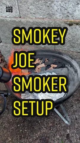 Let’s set up this little grill as a smoker.  I have few smokers and grills, but I wanted to show you that you don’t need fancy grills and tools to get decent results.  If you are thinking about getting into smoking meat, this would be a very affordable way to get started. First find a used Weber Smokey Joe online or on my gear page.  Wrap two thirds of the charcoal grate in two layers of foil to help target the airflow towards the coals. Place a wire mesh on the other side if you are using lump charcoal. Separate the two zones with a piece of metal, I use the long end of a charcoal basket. Create a makeshift aluminum water pan and place it on the foil. Add charcoal and wood chips above the wire mesh. Light one of one end of the charcoal - I’m using a torch, but you can use lighter cubes or paper towels and alcohol.  The coals will slowly burn to the other end during the cook. Insert your meat and probes.  Put on your lid with your top and bottom vents wide open. When it is close to your target temp, close the top and bottom vents about half way to restrict airflow and stabilize the temp. You’ll have to adjust the vents throughout the cook, so keep a close eye on it.  I usually leave the top vent alone and adjust the bottom vent in very small increments. If you find that your meat is drying out you can add water to your pan or spritz. One load of charcoal lasted about 4 hours, so you may have to refill it midway through the cook. I’ll post the full pork butt cook video with this setup soon, so be sure to follow. #bbq #smoker #food #howto #bbqtips #bbqhacks #webergrills