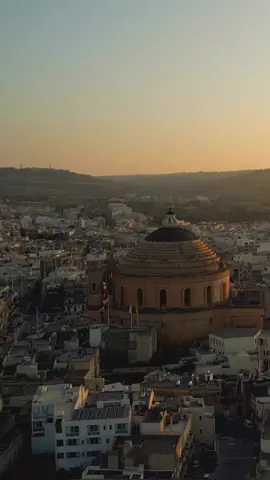 Impressive drone feature by Shiv:   @ travelwithshiv_ The Rotunda of Mosta, also known as the Mosta Dome or the Church of the Assumption, is a famous landmark located in the town of Mosta on the island of Malta.  The church is renowned for its impressive architectural design and historical significance. The Rotunda of Mosta features a massive dome, which is one of the largest unsupported domes in the world. It was built in the 19th century and is an iconic symbol of Mosta. The church gained further prominence during World War II when a bomb pierced the dome during a mass, but miraculously failed to explode, sparing the lives of hundreds of worshippers. Today, the Rotunda of Mosta remains a popular tourist attraction and an important place of worship for the local community. #malta #malta2023 #mosta #mostarotunda #lovinmalta #lovemalta #worldofmalta #goldenhour #sunset #church #dome #djimini3pro #islandlife#thankyoumalta 