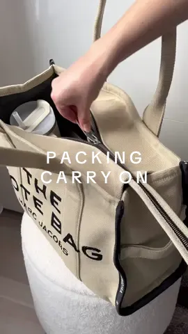 This is your sign to plan a vacation 😍☀️ #packmybag #packingforatrip #packwithme #asmr #packmybagasmr #totebag #grwm #aesthetic #thatgirl #whatsinmybag #packforvacation #packingmytotebag #marcjacobstotebag #travelessentials #satisfying #organization #carryon #packing #fy #fyp #foryou #trending 