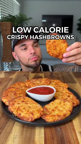 Healthy & Easy Low Calorie Crispy Hashbrowns! Ingredients: 600g Potatoes (Coles Baby Carisma Potatoes - Or Russet Potatoes) 2 Eggs 1 Tbsp Cornflour (or cornstarch) Salt, Onion Powder, Garlic Powder, Paprika & Black Pepper 50g Low Fat Cheese (Bega 50% Less Fat Grated Cheese) #mcdonalds #hashbrowns #potatoes #lowcalorie #weightloss #fatloss #healthyrecipes #EasyRecipe #lowcalorierecipe 