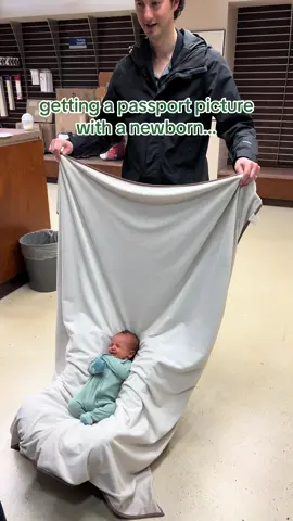 He’ll change his attitude once he’s on the beach in Spain… #travelingwithnewborn #newbornpassport #babypassportphoto 