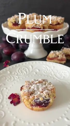 Plum Crumbles Easy Recipe 👩🏻‍🍳 Today, I’m sharing a refreshing very easy recipe for juicy mini plum crumble cakes with crispy streusel - the „Plum Crumbles“! With just a few ingredients, they are simply irresistible! 🧈 Ingredients (makes 6 pieces): - 65g melted butter - 100g all-purpose flour - 50g sugar - 30g rolled oats - 250g plums, pitted and cut into 4-6 pieces - Powdered sugar for dusting (optional) 👩🏻‍🍳 Instructions: 1. Preheat the oven to 180°C (356°F) Convection. 2. In a bowl, mix warm melted butter, flour, sugar, and rolled oats until crumbly streusel forms. 3. Take about 2 tablespoons of the streusel mixture and press it into the bottom of each muffin cup to form a firm crust. 4. Place some of the prepared plum pieces in the center of each cup and top with another layer of streusel. 5. Bake the Plum Crumbles in the preheated oven for about 30 minutes or until the streusel turns golden brown and the plums become tender. 6. Let the Plum Crumbles cool slightly before carefully removing them from the muffin cups. 7. For an added touch of sweetness, you can dust the Plum Crumbles with powdered sugar (optional). This easy recipe requires just a few ingredients and yields 6 delightful mini plum crumble cakes - perfect for enjoying as a delicious dessert or a sweet treat anytime! Bon appétit! 👩🏻‍🍳 #cake #cakerecipe #dessert #dessertrecipe #food #foodrecipe 