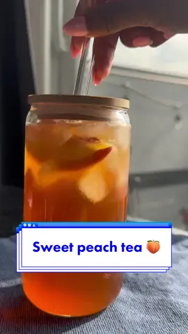 Recipe Below | Sweet Peach Tea  Continuing my Thirsty Thursdays series from last summer!  Ingredients:  7 black tea bags or 4 large family size black tea bags  7 cups water   Peach slices for garnish    Peach syrup: 3 peaches cleaned and sliced  1 ½ c cane sugar or granulated sugar  2 cups of water  Makes 2 ½ quarts  How to: Bring water to a boil. Once boiled, steep the tea bags for about 10-15 minutes.  While the tea is steeping, make the peach syrup.  In a skillet add the peaches, sugar and water. Bring to a boil then reduce to medium. Stir occasionally.  Once the peaches start to get soft, mash them up. Then remove from the heat.  Strain the peach syrup into a container and use a spatula or spoon to press all the juice out of the peaches.  Remove the tea bags from the pot and pour the tea into a pitcher. Add in the peach syrup and stir.  You can serve immediately over ice or put it in the fridge to cool.  Drink and enjoy! 