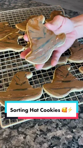 Can you guess what house I’m in?!❤️💛💙💚 WHAT HOUSE ARE YOU???? Sorting hat sugar cookies 🥹🥰⚡️⚡️⚡️⚡️⚡️⚡️ #baker #baking #SmallBusiness #homebaker #dayinmylife #homebaking #sugarcookies #smallbusinesscheck #sugarcookiedecorating #sortinghat #cookies #harrypotterparty 