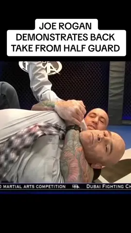Joe Rogan demonstrating a transition from half guard to taking the back 😮‍💨 #fyp #joerogan #bjj #UFC #bjjtraining #mma #jiujitsu #jiujitsutiktok 