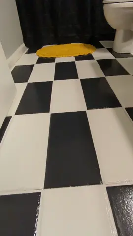 Painted my guest bathroom tile floors! I've always loved black and white checkered floors. #beforeandafter #DIY #paintedtilefloor 