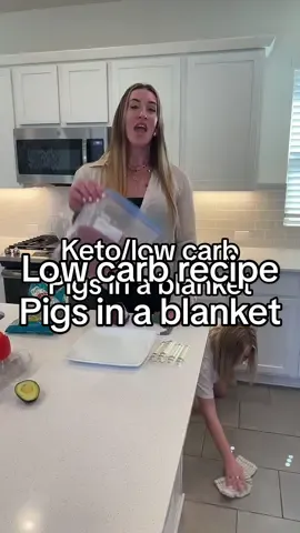 Keto low carb pigs in a blanket recipe. - Ground beef - Broccoli florets - Red onion - String cheese - Favorite seasonings - Pre-heat oven to 400 degrees (F) - Dice the red onions and cut the tops of the broccoli off. Mix together with the ground beef and add your favorite seasonings. - Flatten mixture using a rolling pin or jumping around ridiculously like I did. - Roll mixture around string cheese as shown. - Place on baking tray and cook for 20 min. - Enjoy! - Nutrition doesn’t have to suck.  - And it can be easy. - Details in my bio for my one-on-one fitness and nutrition coaching. - Muah 😘 - Gabbi - #lowcarb #lowcarbrecipes #keto #healthycooking #funnytiktok 