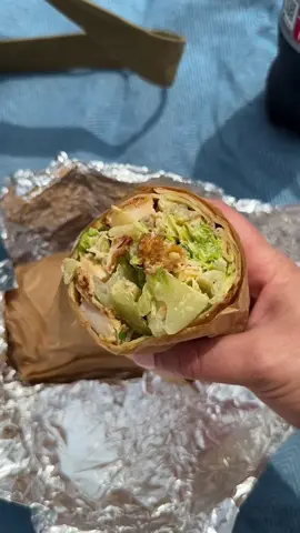 a chicken caesar wrap for a gloomy beach day 