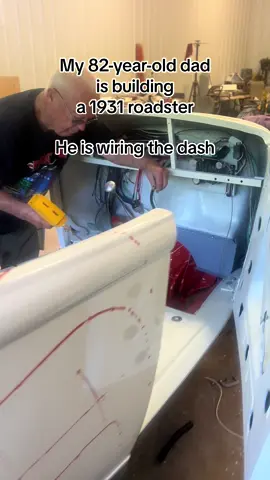 My 82-year-old dad Mike is wiring the dash of his 1931 roadster. He began building this in April. It’s starting to really come together.   #oldcar #oldcars #oldcarchallenge #oldtruck #oldtrucks #barndominium #classiccars #barn #fyp #foryou #foryoupage #viral #classiccar #fypシ #82yearsandgoing #mechanic #mechaniclife #orange #huggerorange #ducktail #ducktailrun #father #fatherdaughter #carbuild 