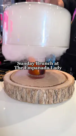 ✨NEW RESTAURANT IN BALTIMORE✨ Bottomless Mimosas Brunch + more at @the_empanada_lady !  I had brunch here last Sunday at The Empanada Lady’s new space and it was a vibe. Food, cocktails, and music were all top tier. Loved the Puerto Rican details of the space like the umbrellas and bodega.  What we tried: ✨Mimosas- great! $35 for bottomless mimosas on Sundays. They also have bottomless bloody Mary’s.  ✨Busy in the Bronx -smoky cocktail. Similar to an old fashioned. Boozy & citrusy ✨Beef Empanada- favorite bite!  ✨Shrimp + Grits- very tomato forward on the sauce. I thought it was good but you definitely want to like the brightness and acidity of tomatoes to enjoy it as well.  ✨Blueberry Lemon Bread Pudding- this was a really good bite! Like a blueberry muffin but next level.  They have other brunch items like a crab omelette, waffles, and roasted potatoes.  If you want to check it out, brunch is every Sunday 11am-4pm. Reservations can be made online.  Juntos Crecemos by Pepsi Co. helps Latino owned business receive long lasting optimizations to their digital and delivery presence.  #baltimorebrunch #baltimorerestaurants #PepsiPartner #empanadas 