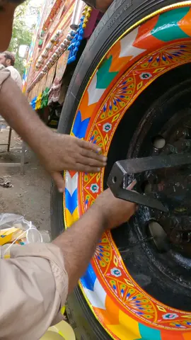 Truck's back wheel Decoration 🚚 Visit our youtybe channel for more videos 🙂🙂... Link is in Description #art #artist #truck #truckart #truckartpakistan #creative #stickers #decoration #wheel #truckwheels #design #colors #instaart #awesome #beautiful #trucklife #trucklovers #artwork #artworkshop #trucking #reels #colorful #foryou #fyp #viral #tiktokindia #pirwadhai #islamabad #folklorepakistan 