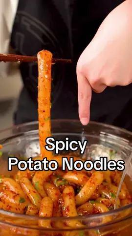 Potato Noodle Thicker than My Finger! It’s covered in a spicy chili sauce with the perfect chew and bouncy texture!  Full Recipe is on our Blog, LlNK is in our Bl0! Just type “NOODLE” in the search!❤️  #potatonoodles #noodles #noodle #asmr #EasyRecipes #fyp 