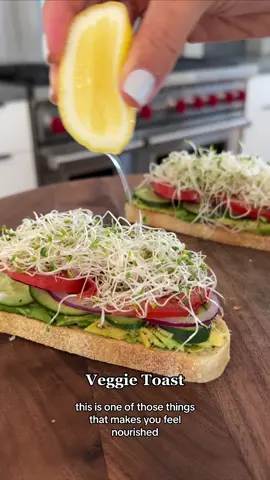 Veggie toast✨ . ▪️Sourdough Bread▪️Avocado▪️Salt & Pepper▪️Persian Cucumber, sliced thin▪️Red Onion, sliced thin▪️Tomato, sliced thin▪️Alfalfa Sprouts▪️Lemon, juice▪️Olive Oil▪️Maldon Salt▪️ . 1️⃣ Toast bread until golden brown and spread on some avocado; season with a little salt and pepper 2️⃣ Add the cucumber, onion, and tomato and sprinkle with a little more salt and pepper 3️⃣ Add the sprouts and top with a lemon squeeze, a drizzle of olive oil and some maldon finishing salt - enjoy! . ⏲5 minute total prep + cook time . #veggietoast #veggies #cookingtiktok #EasyRecipes #lunchideas #healthycooking 