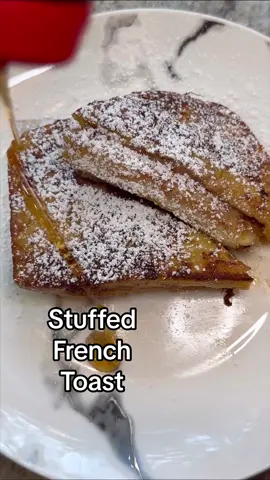 Stuffed french toast should definitely be on your breakfast menu this weekend. #stuffedfrenchtoast #frenchtoast #brunchideas #breakfastrecipes 