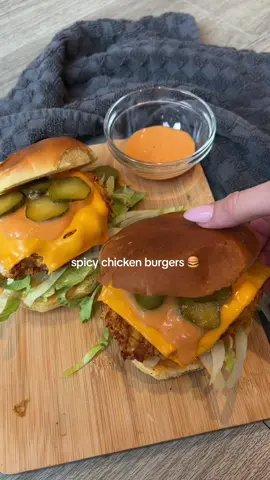 Spicy Chicken Burger 🍔🤤🤤this was BANGING, such an easy recipe & you can tweak the spiciness if heat isn’t your thing and it will still be delicious 🔥 432 calories and nearly 42g protein per bun!!! ✅ Hit SAVE to try for yourself 📌 Ingredients (serves 2):  2 x 100g raw chicken breast flattened Egg whisked  Tsp hot sauce Garlic granules  Onion granules  Mild chilli powder Smoked paprika  Salt  Pepper  30g cornflakes crushed 2 light cheese singles Shredded lettuce Pickles sliced Brioche buns  Sauce:  50g lighter than light mayo  Tbsp hot sauce (reduced for less spicy) Pinch of pepper  Tsp of pickle juice (sub for apple cider vinegar if not using pickles) 1/2 tsp smoked paprika  1/2 tsp garlic  💗Season the chicken with a tsp of garlic and onion granules, smoked paprika, 1/2 tsp chilli powder, salt and pepper to taste.. 💗Whisk the egg with the hot sauce. Crush the cornflakes season with the same as above and mix in. Dip the chicken in the egg and the cornflake mix. Air fry for 15 minutes on 190 degrees.  💗Mix together all of the sauce ingredients, loosen with water until you have a desired sauce consistency and set to one side. 💗Pop the cheese on to the chicken and add back into the airfryer for a minute until it melts. 💗Lightly toast the brioche buns, spread some of the sauce on the bottom, top with the lettuce, chicken, more sauce and gherkins if using.  Calories per bun: 432 | Protein: 41.7g | Fat: 9.5g | Carbs: 44.2g  • • ——— #caloriedeficitmeals #lowcalorierecipes #highproteinmeals #airfryerrecipes #chickenburger #healthyrecipes 