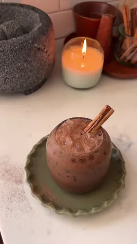Let's make cacao our new caffeine drink in the AM just as the indigenous people of Mesoamerican cultures did  Serves 1 •1 1/2 tablespoons cacao powder (I used @colibrihealing cacao) •1 cinnamon stick (broken into pieces) •1/2 cup filtered water •1 cup non dairy milk of choice (I recommend oat milk) •Small pinch of salt  •1 - 2 teaspoons agave or pure maple syrup  In a pot combine cacao powder, cinnamon? water and milk. Heat over medium-low and Let it come to a simmer. Once simmering, turn off heat. Add salt and agave then mix and let cook for 10 minutes. Before pouring over ice, froth well! I use a traditional Mexican  tool called molinillo!
