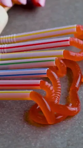 I dare you to eat these worms. Are you scared? 🪱👻 #blossom #worms #jello #edibleworms #foodart #spookyfood #halloweenrecipe #halloweenparty #strawhack #jellohack