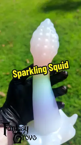 Rainbow shine line squid in the sunlight, packed full of rainbow micro sparkle #fantasytoy #monsterfudgers #rainbow #qinktok #BookTok #witchtok #fantasygrove 
