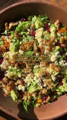Beetroot and pumpkin salad with honey glazed walnuts 🤤 Ingredients (serves about 6) 1 large handful of rocket  300g fresh beetroot, diced 1 avocado, diced  Coriander, chopped 100g feta, crumbled  1 cup honey glazed walnuts (recipe in my previous post) Roasted pumpkin: 400g pumpkin, diced 1 tbsp olive oil 1 tbsp dried mixed herbs or seasonings of choice salt/pepper Couscous: 1/2 cup couscous  1 cup boiling water  Dressing: Juice of 1 lemon  1/3 cup olive oil 1 tbsp honey  2tsp minced garlic  Salt/pepper  Method: 1. Dice up your pumpkin, add to a lined baking tray along with the olive oil and spices. Mix until all the pumpkin is coated and bake for 30 minutes or until cooked. 2. While the pumpkin is cooking, prepare all the other ingredients. Cook couscous as per directions and make the honey glazed walnuts and dressing.  3. In a large salad bowl add the rocket, couscous, pumpkin, beetroot, avocado, coriander, feta, walnuts and the lemon and honey dressing. 4. Mix serve and enjoy!   #saladrecipes #saladrecipe #healthysaladrecipes #saladlover #foodasmrsounds #sidesalad #summersalads 
