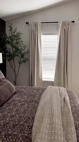 The absolute best way to hang curtains??? High & wide!!! These @inovaday_home curtains (#gifted) are giving my bedroom the perfect neutral, organic vibe! The longer drapes make the room look bigger and show off our vaulted ceiling! These are the 96” blackout curtains in cream with back tabs… and for someone who LOVES sleep, these darken my room so much better than the blackout curtains I had before 🙌🏻  Are you a fan of blackouts in your bedroom? 💤  You can find these and the rest of my bedroom linked in my shop on the LTK app @jotitup!  Save this post & follow for more affordable home decor with a mix of moody, neutral vibes and a vintage modern look! 😍 . . . . . . #blackoutcurtain #blackoutcurtains #linencurtains #bedroomcurtains #organicbedding #organicmoderndecor #moodyneutral #fallhome #autumnhomedecor #autumnhome #neutralcurtains #neutralbedroom #vintagemodernmix #modernvintagestyle  Affordable home decor, neutral moody mix, blackout curtains, neutral bedroom inspo, curtain tips, design on a budget, organic modern decor, upholstered bed, neutral curtains