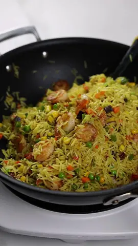 Drop a 💛 if you love fried rice  Ingredients  Fried rice (serves 5-6 people) whole chicken( cut up)2148g * Handful of onion * 3 garlic gloves  * 2 teaspoons thyme  * 1 tablespoon curry powder  * 2 teaspoons salt * 4 crushed chicken bouillon cubes (2 cubes)  *1 cup water  * 4 cups rice  * 1 cup water * ½ teaspoon salt * ½ -1 teaspoon curry powder  * ½ bell pepper * oil for frying the chicken or oil spray for air frying Veggies: * 1 large carrot  * ½ green bell pepper * 6 green beans  * 3 bunch green onions * ¼ cup peas * ¼ cup sweet corn  Veggies seasoned with: * ½ teaspoon chicken seaoning * ¼ teaspoons salt * 1 teaspoon white pepper For the shrimp  * ½ lbs shrimps —seasoned with: * Pinch of salt * ¼ teaspoon chicken seasoning  * ½ teaspoons onion powder * 1 tablespoon Oil for frying  For the liver: * ½ lb beef liver  * ½ teaspoon salt * 2 chicken seasoning cube  * 1 cup of water . . . #friedrice #rice #nigerianfood 