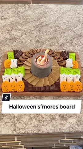 Halloween s’mores board!! I’m OBSESSED with this table top fire pit! I found it on Amazon! We even made s’mores at the dining room table last night!😂 We love this fire pit lol The peeps were delicious roasted for s’mores.👻👻 #tabletopfirepit #smoresboard #halloweenfood #halloweenfoodideas #halloweenideas #halloweenpartyideas #diyhalloween #fallfood #halloweenidea #diyhalloweendecor 