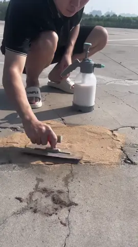 Fixing the parking lot one pot hole at a time