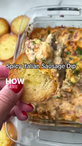 The best football snack. Spicy italian sausage dip loaded with banana peppers #cheesedip #sausagedip #spicyitaliansausage #footballsnacks #footballappetizers #holidayappetizers 
