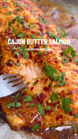 Looking for an impressive main dish? This gorgeous Cajun Honey Butter Salmon is a beautiful centrepiece and it tastes delicious. Plus, you only need a few ingredients to make this mouthwatering flaky fish. Serve it with salad, vegetables or any other side of your choice. ✨✨✨ Here’s what you’ll need:  * 1/2 a whole salmon fillet deboned * 1/4 cup of unsalted butter softened or melted * 3 tbsp honey * 1/2-3/4 tsp red chilli flakes * 2 tsp Cajun seasoning * 1/2 lemon juice squeezed and zest * 3 garlic cloves grated * Parsley to garnish Don’t forget to baste the salmon with the cajun butter every 5 minutes as it bakes to give it its beautiful colour! #cajunbuttersalmon #cajunsalmon #cajunhoneybuttersalmon #salmon #salmondinner 