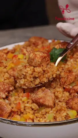 البرغل التركي مع الدجاج بطعم شهي جدا و طريقة سهلة 😍😋 مدة التحضير : ساعه الكميه تكفي : 4 اشخاص لتحضير البرغل 2م ك  زيت زيتون 4صدر دجاج مخلي الجلد والعظم نصف كوب بصل مفروم 1م ك  توم مهروس 2كوب فلفل حلو الوان مفروم 1م ص ملح نصف م ص فلفل اسود نصف م ص كمون نصف كوب معجون طماطم 3كوب برغل خشن  3كوب و3/4 ماء ساخن للتزيين : مكسرات . بقدونس طريقة التحضير: 1-ننقع البرغل لمدة 5د في ماء بارد 2-ونحضر الخضار بفرمها ناعمآ  3-في طنجره على النار نضيف مقدار الزيت ونشوح البصل قليلآ 4-نضيف التوم ثم الفلفل الحلو ونشوحهم سويآ 5-ثم نضيف معجون الطماطم والملح والتوابل ونقلبهم سويآ 6-نضيف مقدار البرغل المنقوع مسبقآ ونقلبهم سويآ  7-نضيف مقدار ماء ساخن بنفس ارتفاع البرغل وندعه يغلي قليلآ 8-نهدء النار على اقل درجة حراره مع وضع الغطاء وندعه ينضج لمدة 20د 9-نقطع الدجاج كيوبس ونتبله بخليط التتبيله  10-في مقلاه محميه مسبقآ نضيف الدجاج ونشوحه حتى يكتسب للون ذهبي ونرفعه عن النار 11-عند التقديم نسكب البرغل مع الخضار ثم نرص الدجاج على الوجه ويزين حسب الرغبه ويقدم دافئ.#وصفة #وصفات_سهله #فودشيني #Recipe #tiktokcookbook #foodccine #Recipe #tiktokcookbook #foodccine #وصفات_طبخ #طعام #food #وصفات_طبخ #غداء #طبخ 