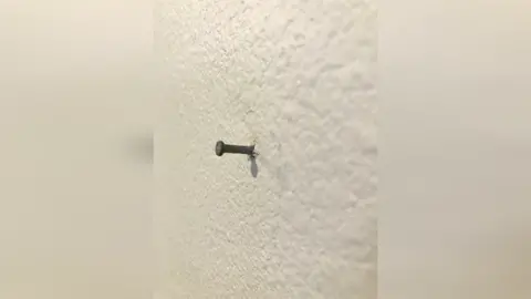How to patch the wall when you decided to move the picture to the different place. Nothing crazy just a simple touch up. 👍#howto #patch #a #hole #in #the #wall #nail #DIY #fyp #easy #job 