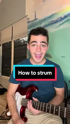 How to strum the guitar for beginner guitarists! #guitar #guitartok #beginnerguitarlesson #fyp #fypシ #viral