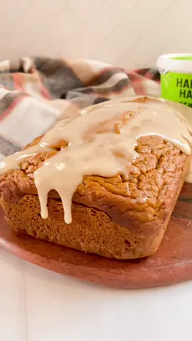 Pumpkin bread is a must-bake during the fall, but have you tried it drizzled with a creamy coconut maple glaze? 🤤🎃🍞 Dairy-Free Pumpkin Bread with Coconut Maple Glaze Recipe      Pumpkin Bread Ingredients:  • 1 cup Harmless Harvest Organic Coconut Yogurt   • 1 ¾ cups all-purpose flour  • 1 teaspoon baking soda  • 1/2 teaspoon baking powder  • 1/2 teaspoon salt  • 1 teaspoon ground cinnamon  • 1 1/2 teaspoons pumpkin pie spice  • 1 cup canned or homemade pumpkin puree  • 1/2 cup unsweetened applesauce  • 1/2 cup Harmless Harvest Unsweetened Plain Dairy-Free Yogurt Alternative   • 1/2 cup honey or pure maple syrup  • 2 large eggs  • 1 teaspoon vanilla extract  • 1/4 cup melted coconut oil    Maple Coconut Glaze Ingredients:  • 1 cup confectioners sugar   • 3 tbsp pure maple syrup   • 3 tbsp Harmless Harvest Unsweetened Plain Dairy-Free Yogurt Alternative   • ½ tsp vanilla extract   • Pinch of salt     Instructions:  1. Preheat oven to 350°F. Grease a 9x5 inch loaf pan or line it with parchment paper for easy removal.  2. In medium-sized bowl, whisk together all-purpose flour, baking soda, baking powder, salt, ground cinnamon, and pumpkin pie spice to form foundation of bread.  3. In a separate large bowl, combine the pumpkin puree, unsweetened applesauce, unsweetened plain yogurt, honey (or pure maple syrup), eggs, and vanilla extract.  4. Gradually add the dry ingredient mixture to the wet ingredients, stirring until just combined. Avoid overmixing to achieve a smooth, integrated batter.  5. Gently fold in melted coconut oil and pour batter into prepared loaf pan, ensuring it’s evenly spread.  6. Bake for 45 to 55 minutes or until a toothpick inserted into the center comes out clean or with a few crumbs attached.  7. Let cool in pan for about 10 minutes before transferring to a wire rack to cool completely while starting on glaze.  8. Sift confectioners’ sugar into mixing bowl and add maple syrup, unsweetened plain yogurt, and vanilla extract. Mix gently with whisk or fork until a smooth glaze forms.  9. Pour glaze over cooled bread immediately. Slice and enjoy! #pumpkinbreadrecipe #pumpkinbreadwithfrosting #coconutyogurt 