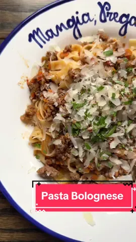 My version of PASTA BOLOGNESE has been simplified, but is still packed with flavor! If you prefer your meat sauce to be more “saucy”, I suggest doubling what my recipe recommends.  Serves 4-6 Ingredients: 2 carrots small carrots 2 celery stalks 1 medium-sized onion 2 tbsp butter 1 tbsp olive oil 1.25 lb ground beef 1 tsp salt 1/2 tsp pepper 1/2 tsp nutmeg 1/2 cup red wine 3 bay leaves 2.5 cups sauce homemade or store bought 3/4 lb tagliatelle Grated Parmigiano Reggiano -FINELY mince carrots, celery and onion either by hand or using a food processor. It’s important that the battuto be very finely minced. -Add butter and olive oil to a large skillet (mine was 11inch round) and increase stove temp to medium. Once the butter starts to foam, add minced veggies and cook for about 4 minutes or until onions are translucent. -Next add the ground beef. Use a spatula to break the meat apart into very small pieces while it cooks.  -Once the meat is fully cooked add salt, pepper, nutmeg (do not skip the nutmeg) and wine. Mix to combine and cook until the alcohol burns off, about 4 minutes.  -Add bay leaves and the sauce. Mix, lower the heat, cover and let simmer for 45 minutes. -Cook pasta and reserve 1 cup of the starchy pasta water before draining.  -Remove sauce from heat, mix in pasta water and add tagliatelle directly to the pan.  -Serve warm with lots of grated Parmigiano Reggiano! #pastalover #pastarecipe #bolognesesauce #meatsauce #EasyRecipe #dinnerrecipes #italianfood #simplerecipes #yum #cookingvideo