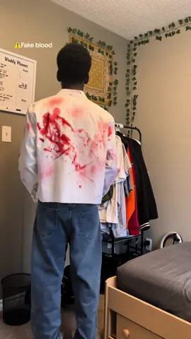 I feel like i did too much at the front but the back is sick👌🏾what do y’all think? #halloween #halloweencostume #bloodyshirt #halloweenlook #fyp #vampire #outfitcheck #fashion #thepurge 