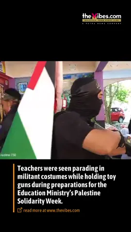 Teachers were spotted carrying toy guns in a school as part of a show of solidarity with Palestinians under blockade in Gaza. A man was seen in this video leading a group of teachers into an assembly while brandishing a toy gun, pointing it at pupils, and seemingly wearing a bulletproof vest. This happened in a primary school believed to be in Klang. One of the teachers was spotted waving a sign, while others waved the Palestinian flag or wore Palestine-themed scarves around their faces and shoulders. Some also had toy guns. #thevibesnews #palestine 