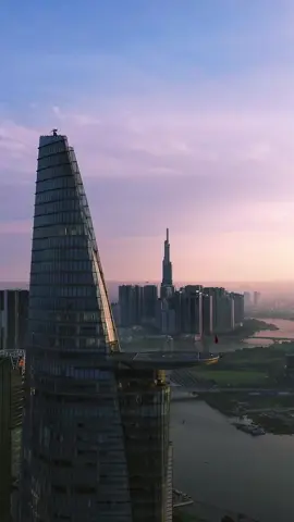 Where is this? 🤩🤩🤩 Awesome sunrise in Ho Chi Minh City with Bitexco and Landmark 81. . . . . #saigon #bitexco #hochiminhcity #landmark81 #vietnam #sunrise #travel #city #drone #dji #flycam #cityscape 