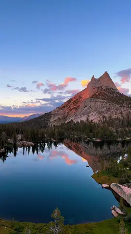 •| Favorite spot in Yosemite⛰️📍 |•  This is Upper Cathedral Lakes in Yosemite National Park 📍 No doubt this is one of the most beautiful places in Yosemite. Definitely my favorite one. I have been trying to go to this spot for a long time and this summer I finally made it. I did a 3 day backpacking trip starting from Cathedral Lakes Trailhead and ending at the Valley.  To get here it’s actually a pretty easy hike! It is 9.5 miles round trip with 1600 Ft of elevation gain. It takes an average of 4:30-5 hrs to complete it. Make sure you check out the map on @alltrails  Make sure you always follow the 7 principles of Leave No Trace and respect the wilderness  Filmed with iPhone 14 Pro 📱 #yosemite #wanderlust #explore #sunset #lake 