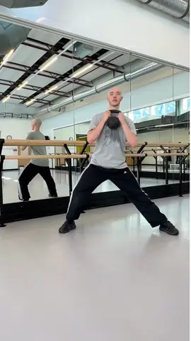The Cossack Squat is a great way to load lateral movement. It is named after the Cossack warriors, who were known for their agility and strength. The Cossack squat's asymmetrical nature provides unique benefits for dancers: Asymmetrical Strength Development: Dance often involves asymmetrical movements and positions. The Cossack squat, with its lateral and single-leg emphasis, helps develop strength in a way that mirrors the uneven demands of dance, contributing to more balanced muscle development. Targeting Imbalances: Dancers may have side-to-side muscle imbalances due to the repetitive nature of certain movements. The Cossack squat addresses these imbalances by requiring independent strength from each leg, promoting equal development and reducing the risk of overuse injuries. Enhanced Coordination: The asymmetrical nature of the Cossack squat challenges coordination and motor control. This can be particularly beneficial for dancers who need precise control over their movements, enhancing their ability to perform complex routines with grace and accuracy. Improved Stability in Uneven Positions: Dancers frequently perform in positions that require stability on one leg or in tilted positions. The Cossack squat, with its emphasis on controlled lateral movement, helps build stability in these challenging positions. #strongdancers #ballet #dancer #cossacksquat #laterallunges #strengthtrain 