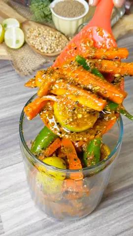 ✨Gajar Or Nimbu Ka Achaar✨ This is a tried and tasted, fail proof, instant Gajar Ka Achaar Recipe... Learn how to Make Gajar Ka Achaar at home Full Recipe is uploaded on my YouTube Channel ❤️ https://youtu.be/Yz-MSXCzYl0?si=a5htGPYioKLsUCAX GAJAR KA ACHAAR  INGREDIENTS: • Green Chillies 250 Gm • Lemon 250 Gm • Carrots ½ KG • Turmeric Powder 1½ Tbsp • Salt 1 Tbsp • Mustard Seeds 1½ Tbsp • Fennel Seeds 1½ Tbsp • Coriander Seeds 1½ Tbsp • Fenugreek Seeds 1 Tbsp • Black Peppercorns 1 Tbsp • Cumin Seeds 1½ Tbsp • Carom Seeds 1 Tbsp • Mustard Oil  • Prepared Achaar Masala  • Salt 1 Tbsp • Red Chilli Powder 1 Tbsp • Nigella Seeds 1 Tbsp  METHOD:  • In a bowl, add green chillies, lemon, carrots, turmeric powder and salt, mix well & Transfer the mixture in strainer and leave it for 2-3 Hours • In a pan, add mustard seeds, fennel seeds, coriander seeds, fenugreek seeds, black peppercorns, cumin seeds, carom seeds and bay leaf, roast until aromatic & set aside • Let it cool down • In a spice mixer, add roasted garam masala and grind all the spices • In a separate bowl, add Vegetable mixture, hot mustard Oil, prepared grounded masala, salt, red chilli powder and nigella Seeds (kalonji), mix well and set aside • In a jar, add prepared Achaar and cover tightly with a lid and keep it in sunlight for 2 more days • Gajar Ka Achaar is ready to Serve • SERVE & ENJOY! ❤️ #trending #reels #viralreels #foryou #fyp #foryoupage #gajarkaachaar #achaar #recipesoftiktok #winters #viralvideo 