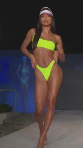 Stunning in green! 💚 Watch her own the catwalk in this jaw-dropping bikini at the fashion show. Confidence in every step! 👙✨ #RunwayGoddess #BikiniBeauty #GreenEnvy
