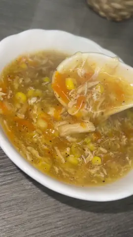 Chicken Hot and sour soup, this soup always reminds me of the streets of Kabul, Afghanistan. It would be served with chips and boiled eggs and would always satisfy cravings. Recipe is written below                                                                                          Ingredients: - 3 tbsp Oil - 1 Chicken breast  - 1 tsp Ginger -  1 tsp Garlic -  Water 2.5 Litre - 2 Carrots - 1 Cup sweetcorn - 1 Chicken cube  - 2 tsp Black pepper  - 1 tsp Salt - 3 tbsp Light Soy sauce  - 2 tbsp Chilli garlic sauce  - 4 tbsp Vinegar  - 4 tbsp Cornflour - 2 Eggs Method: 1. Cut chicken breast and slightly cook in the oil on medium heat, add grated ginger and garlic. Once chicken is golden brown, add water.  2. Grate 2 carrots using a grater and add to the pot along with frozen sweetcorn and chicken cube. Add black pepper and salt.  3. Remove chicken and shred into small pieces and put back into the soup.  4. Add soy sauce, chilli garlic sauce and vinegar. You can add more or less depending on how you like it.  5. Make a cornflour mixture by adding water to cornflour and add it to the soup slowly while stirring. This will thicken the soup nicely.  6. Break eggs slightly and add into soup slowly stirring. Add more eggs if you prefer.  Serve with boiled eggs and chips for the full street experience. I love this soup with extra soy sauce and vinegar. Hope you enjoy it :)  #afghan#afghanfoods#afghanfood#afghanfood🇦🇫#soup#chickensoup#hotsoursoup#chicken#afghanistan#afghanistan#afghanistan🇦🇫#afghanistanfood#watani#kabul#fyp#foryou#cooktok#cooking#sweetcornsoup