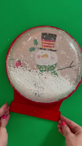 A snow globe that is double duty- super cute sitting on the shelf- AND a fun Ispy game! What do you think?? #snowglobe #dollartree #dollartreecrafts 