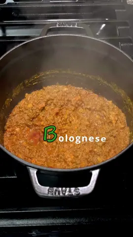 B is for Bolognese🍝 This is the updated recipe for Bolognese Sauce, submitted by the City of Bologna to the Italian Culinary Academy in 2023.  There ARE some tolerated variations in addition to the most classic recipe that I chose here, so just look up “Accademia Italiana Della Cucina Bolognese” to find the complete list of acceptable variations.  Pot by @staub_usa  Spoon by @earlywood_designs  THE RECIPE: Extra Virgin Olive Oil 150g Pancetta (Sliced) 60g Onion (Finely Diced) 60g Carrot (Finely Diced) 60g Celery (Finely Diced) 400g Ground Beef 120g (1 Glass) White (or Red)  Wine 8g Tomato Paste 200g Tomato Puree 240g Vegetable Broth 120g Whole Milk Salt and Pepper (To taste) -Melt the Pancetta in a Heavy Non-stick 10in (24-26cm) enamelled cast iron pan. Thanks, @staub_usa for providing the official pot.  -Finely chop by hand (no food processors allowed) the onions, carrots, and celery, then let those sweat in the pot on low until soft but not browned.  -Continue stirring with a WOODEN spoon and then add ground beef (a bolognese can have ground pork as well, but it must be at least 51% beef) Thanks @earlywood_designs for the official wooden spoon! -Once browned, pour in wine to deglaze (scrape clean) the pan and cook till completely evaporated -Add tomato paste and puree and vegetable stock (water can replace the stock, but I find that if you start the stock with the vegetable scraps from you finely diced veggies, it makes a pretty decent stock in the time it takes to cook the meat and veggies anyway) -Simmer with the lid on for 2 hours, adding the milk halfway through -Only after fully reduced to a thick meat sauce, add salt and pepper to taste Enjoy with fresh tagliatelle, or in a tasty lasagna, or however you like your bolognese #italianfood #bolognese #cucinaitaliana #Recipe #bologna