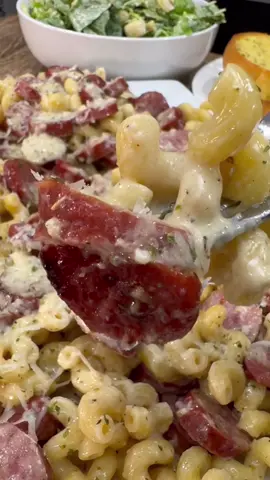 Kielbasa Alfredo Pasta is so good!  INGREDIENTS  2 12 oz packs of Kielbasa  10 oz pasta  1/2 tsp Salt and Pepper 1 tsp Garlic Powder and Italian Seasoning  1 stick of butter  2 TBSP of minced garlic 1 1/4 cups of heavy cream 1 1/4 cup shredded Parmesan cheese Dried parsley  INSTRUCTIONS  Cook pasta according to the directions on the box.  Cut kielbasa into rounds. In a skillet over medium high heat, cook kielbasa until browned to your liking. Remove the kielbasa from the pan and set aside.  Melt 1 stick of butter over medium heat and add minced garlic stirring well. Add heavy cream, stirring constantly.  Add 1/2 tsp each of salt and pepper and 1 tsp of Italian seasoning. Add 1 1/4 cup of shredded Parmesan cheese stirring until it thickens.  Once the Alfredo is to the consistency you like add cooked pasta and top with kielbasa. Stir until well combined.  Serve and top with Parmesan cheese and some dried parsley. Enjoy! #dinner #Recipe #EasyRecipes #DinnerIdeas #alfredo 